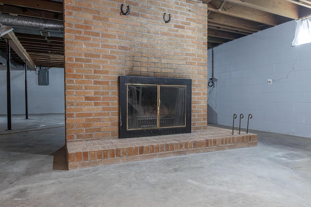 111 Hagan Ct, Lancaster, KY 40444 - detailed view of concrete floors, electric panel, and a fireplace