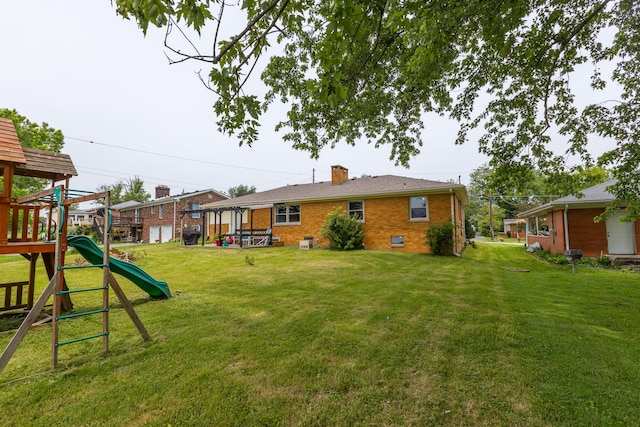 111 Hagan Ct, Lancaster, KY 40444 - view of grassy yard with a playground
