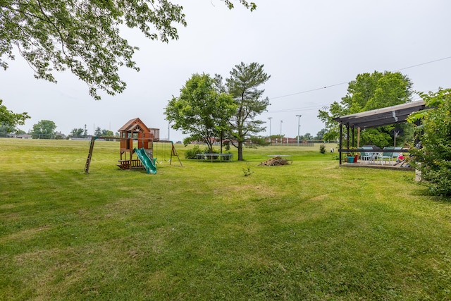 111 Hagan Ct, Lancaster, KY 40444 - view of green lawn featuring a playground