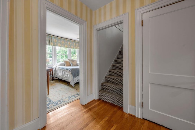 315 Desha Rd, Lexington, KY 40502 - stairway featuring wallpapered walls and hardwood / wood-style floors