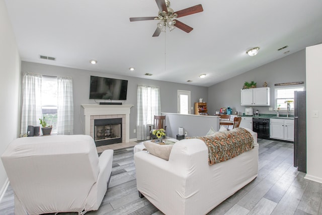 4026 Briar Creek Dr, Lawrenceburg, KY 40342 - living area featuring a fireplace, light wood-style flooring, a ceiling fan, lofted ceiling, and recessed lighting