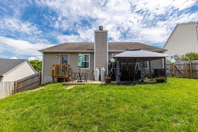 4026 Briar Creek Dr, Lawrenceburg, KY 40342 - rear view of house featuring a chimney, a gazebo, a patio, and a fenced backyard
