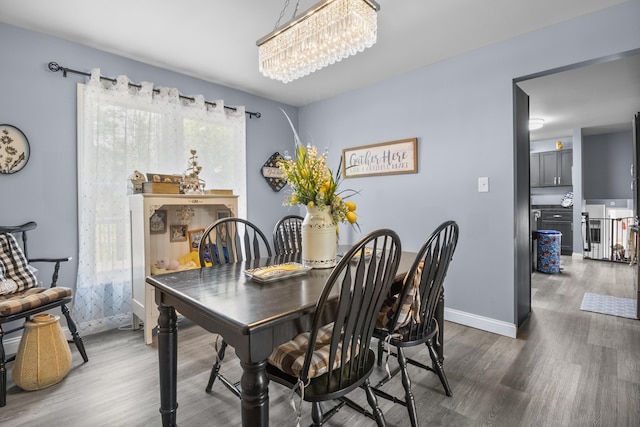 168 Perry Ln, London, KY 40741 - dining space with wood finished floors and a chandelier