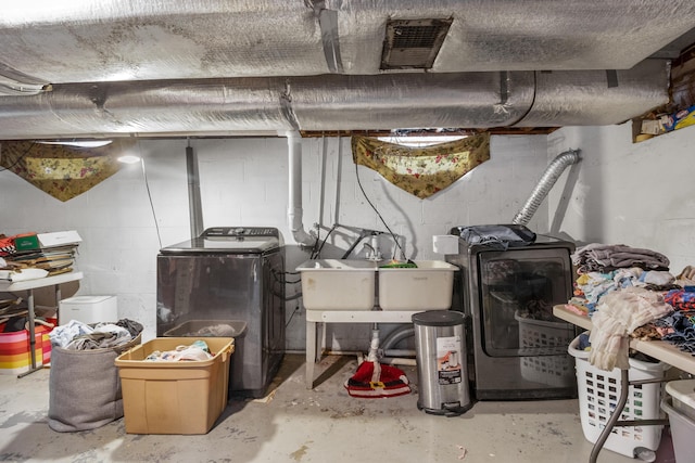 168 Perry Ln, London, KY 40741 - unfinished basement featuring washing machine and clothes dryer and concrete block wall