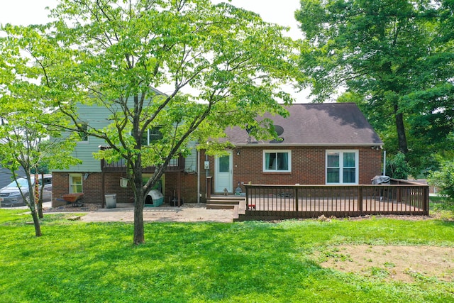 168 Perry Ln, London, KY 40741 - view of front facade featuring a front lawn, a deck, and brick siding