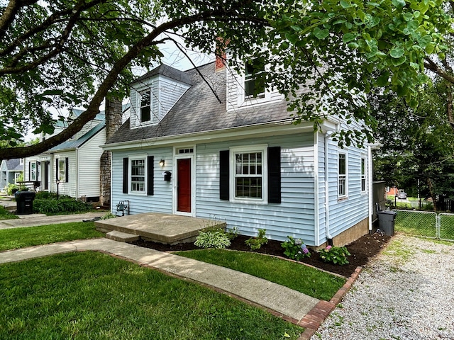 113 Pickett Ave, Frankfort, KY 40601 - new england style home featuring a shingled roof