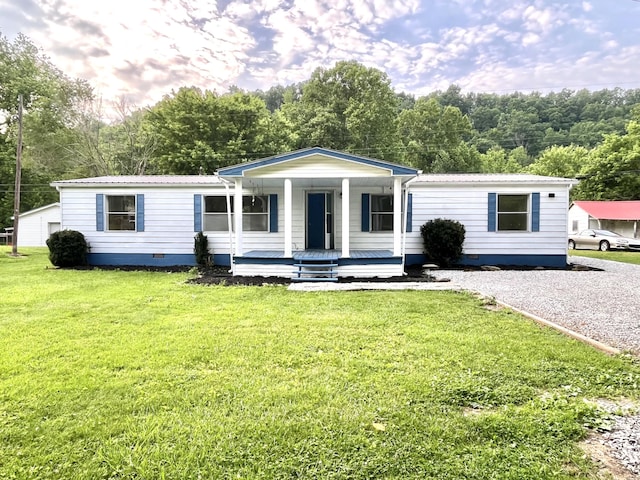 6006 US-60, Morehead, KY 40351 - manufactured / mobile home featuring covered porch, crawl space, a front yard, and a metal roof