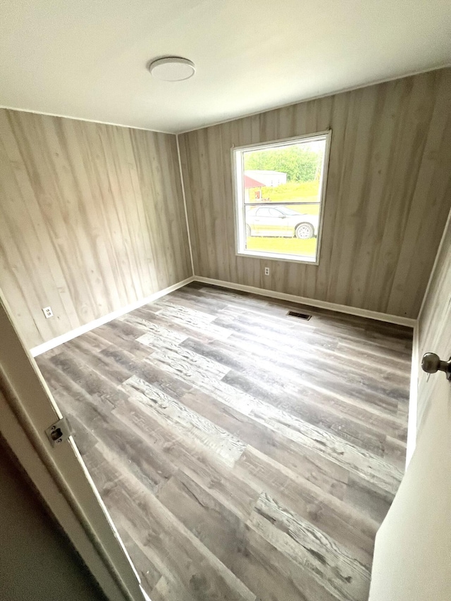 6006 US-60, Morehead, KY 40351 - unfurnished room with wood finished floors and wood walls