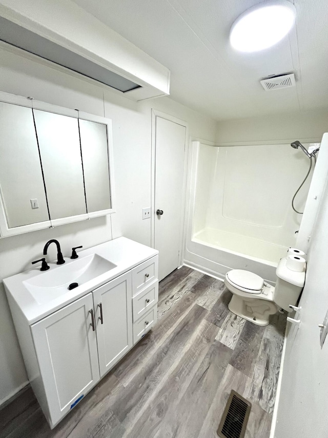 6006 US-60, Morehead, KY 40351 - full bath with wood finished floors, vanity, and shower / bath combination