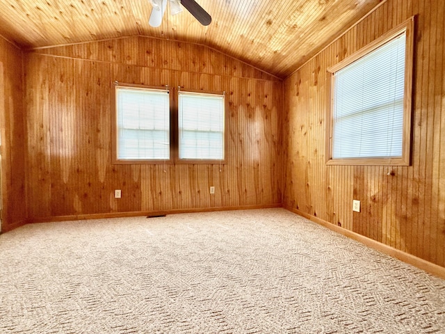 1012 Heathcliff Dr, Richmond, KY 40475 - unfurnished room featuring vaulted ceiling, ceiling fan, plenty of natural light, carpet flooring, and wood walls