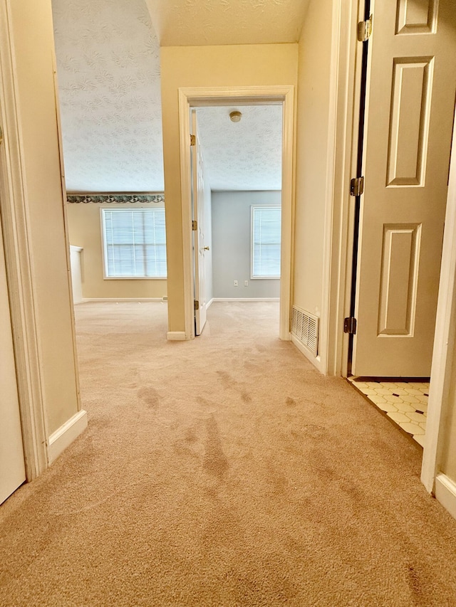 1012 Heathcliff Dr, Richmond, KY 40475 - hallway with a textured ceiling and carpet