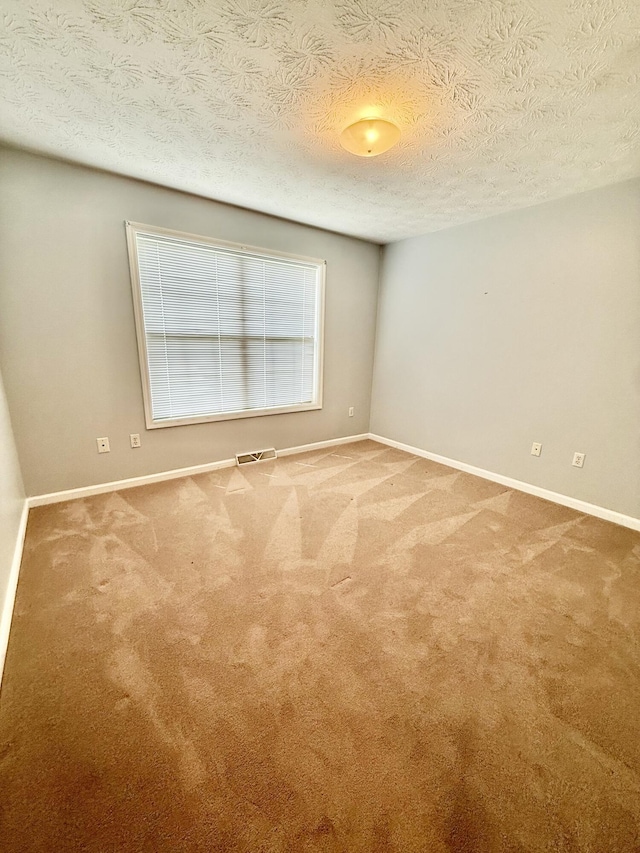1012 Heathcliff Dr, Richmond, KY 40475 - spare room with carpet flooring and a textured ceiling