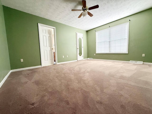 1012 Heathcliff Dr, Richmond, KY 40475 - unfurnished room with a ceiling fan, a textured ceiling, and carpet flooring