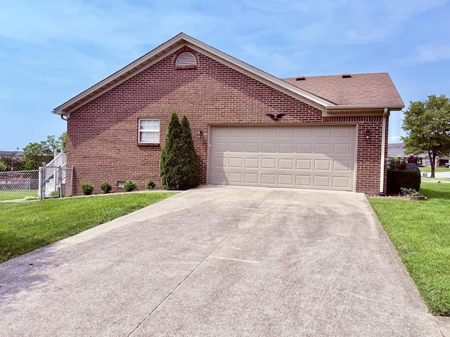 1012 Heathcliff Dr, Richmond, KY 40475 - view of property exterior featuring brick siding, concrete driveway, a shingled roof, and a garage