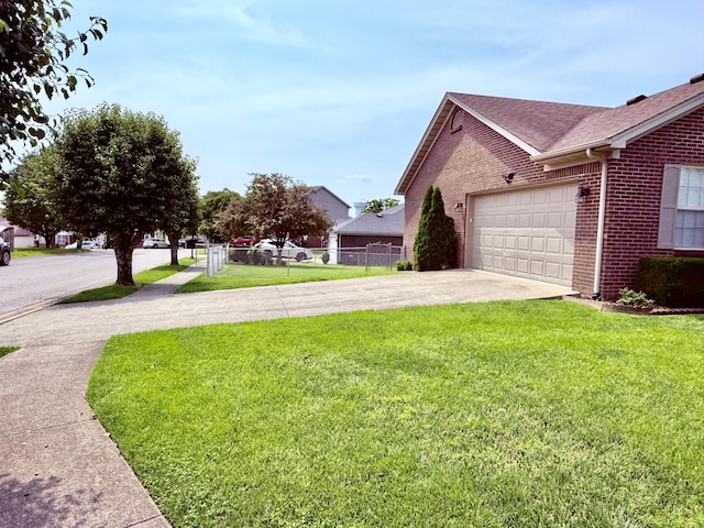 1012 Heathcliff Dr, Richmond, KY 40475 - view of property exterior featuring brick siding, an attached garage, concrete driveway, and roof with shingles