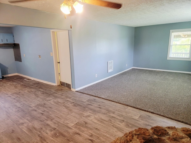 3380 Upton Talley Rd, Upton, KY 42784 - unfurnished room featuring ceiling fan, a textured ceiling, and wood finished floors