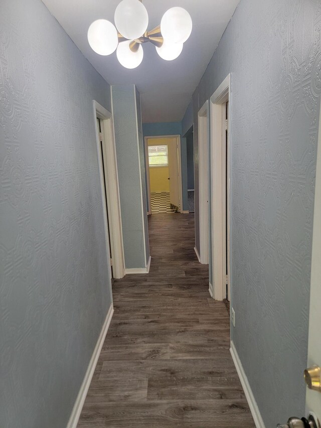 3380 Upton Talley Rd, Upton, KY 42784 - corridor with dark wood-type flooring and a chandelier