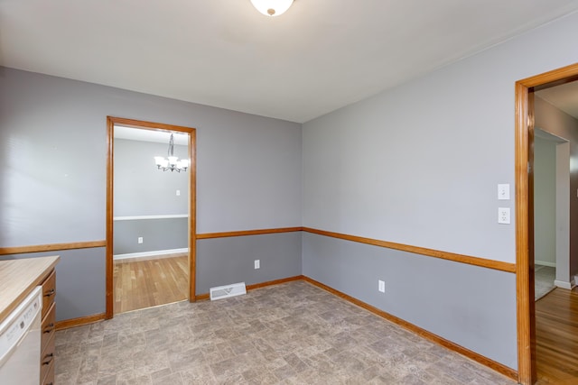 120 Vanderbilt Dr, Lexington, KY 40517 - empty room featuring a chandelier and baseboards