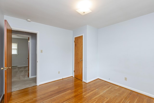 120 Vanderbilt Dr, Lexington, KY 40517 - empty room with light wood-type flooring and a smoke detector