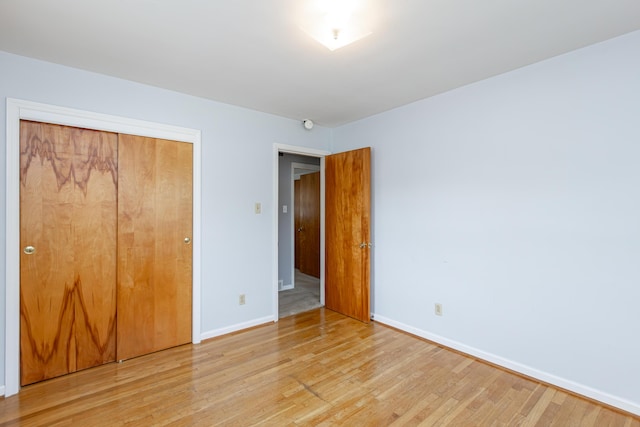 120 Vanderbilt Dr, Lexington, KY 40517 - unfurnished bedroom featuring light wood finished floors and a closet