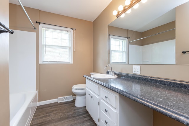 120 Vanderbilt Dr, Lexington, KY 40517 - bathroom with vanity, wood finished floors, and shower / washtub combination