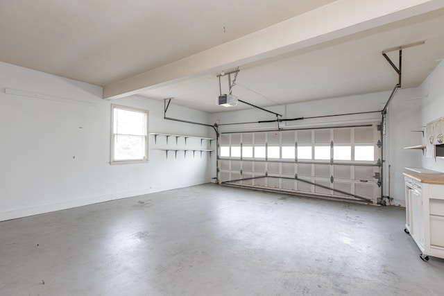 120 Vanderbilt Dr, Lexington, KY 40517 - garage with a garage door opener and baseboards