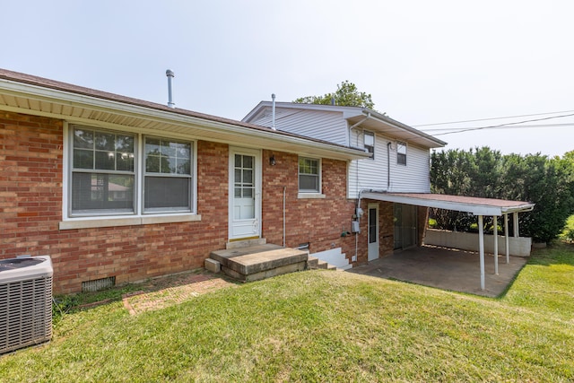 120 Vanderbilt Dr, Lexington, KY 40517 - rear view of house with a yard and brick siding