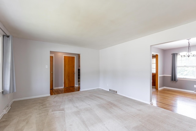 120 Vanderbilt Dr, Lexington, KY 40517 - empty room featuring a chandelier and light colored carpet