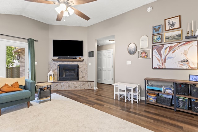 821 White Wood Flt, Lexington, KY 40511 - living room featuring ceiling fan, wood finished floors, vaulted ceiling, and a tile fireplace