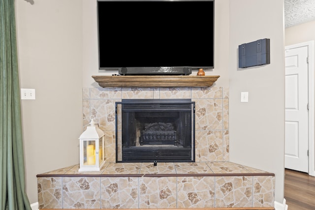 821 White Wood Flt, Lexington, KY 40511 - detailed view of wood finished floors and a fireplace with raised hearth