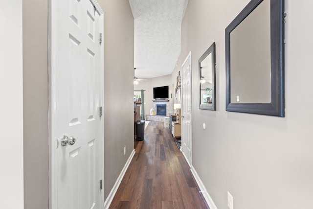 821 White Wood Flt, Lexington, KY 40511 - hall featuring dark wood-style floors and a textured ceiling
