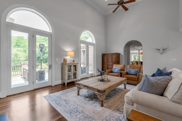 103 Windridge Dr, Nicholasville, KY 40356 - living area featuring a ceiling fan, arched walkways, wood finished floors, a high ceiling, and crown molding