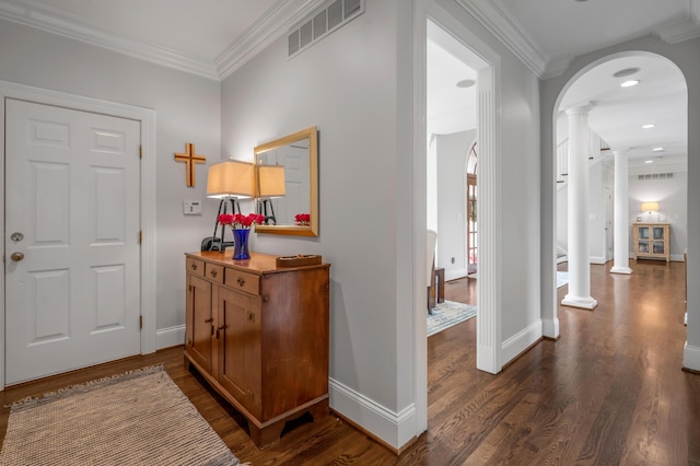 103 Windridge Dr, Nicholasville, KY 40356 - entryway featuring decorative columns, arched walkways, dark wood finished floors, ornamental molding, and recessed lighting