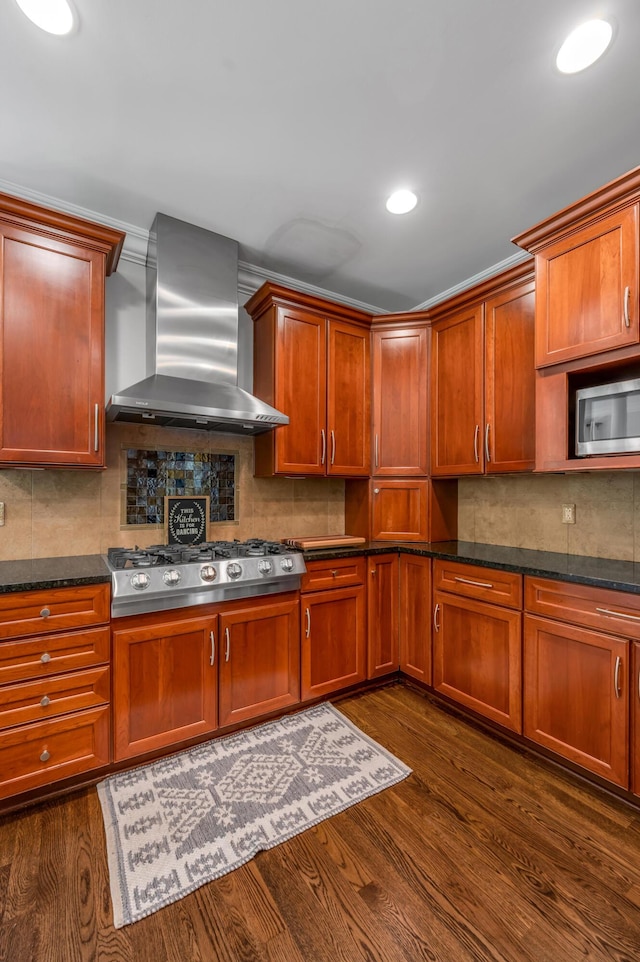 103 Windridge Dr, Nicholasville, KY 40356 - kitchen featuring wall chimney range hood, stainless steel appliances, tasteful backsplash, dark wood-type flooring, and recessed lighting