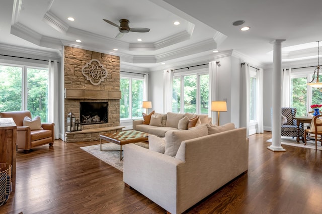 103 Windridge Dr, Nicholasville, KY 40356 - living area featuring a raised ceiling, decorative columns, ceiling fan, dark wood-style flooring, and ornamental molding