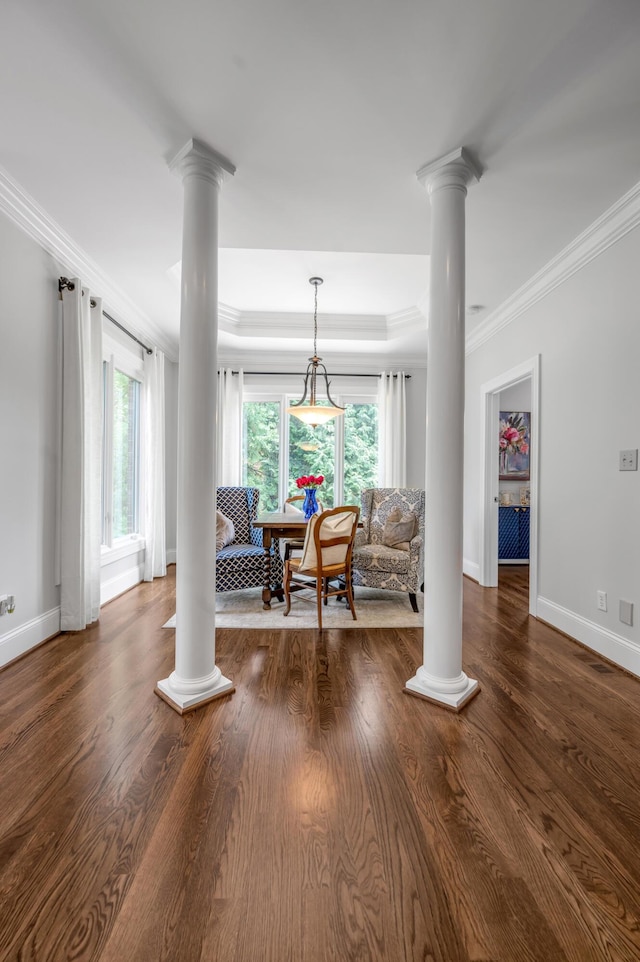 103 Windridge Dr, Nicholasville, KY 40356 - living area with ornate columns, ornamental molding, healthy amount of natural light, and wood finished floors
