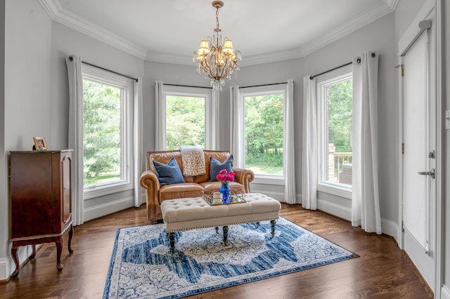 103 Windridge Dr, Nicholasville, KY 40356 - living area with healthy amount of natural light, a chandelier, crown molding, and wood finished floors