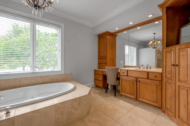 103 Windridge Dr, Nicholasville, KY 40356 - bathroom featuring a chandelier, a jetted tub, vanity, ornamental molding, and tile patterned floors