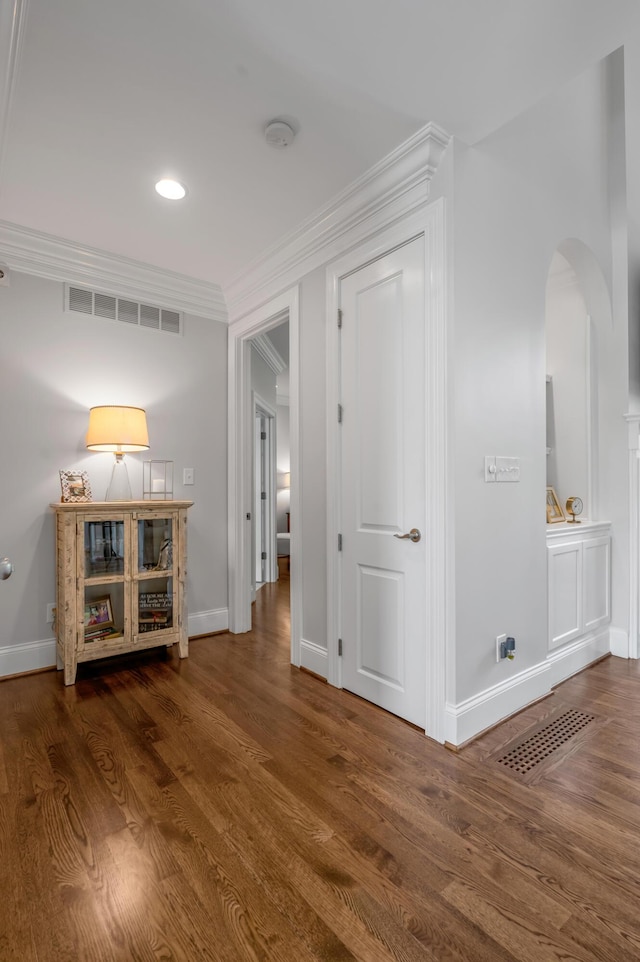 103 Windridge Dr, Nicholasville, KY 40356 - hall with arched walkways, wood finished floors, crown molding, and recessed lighting