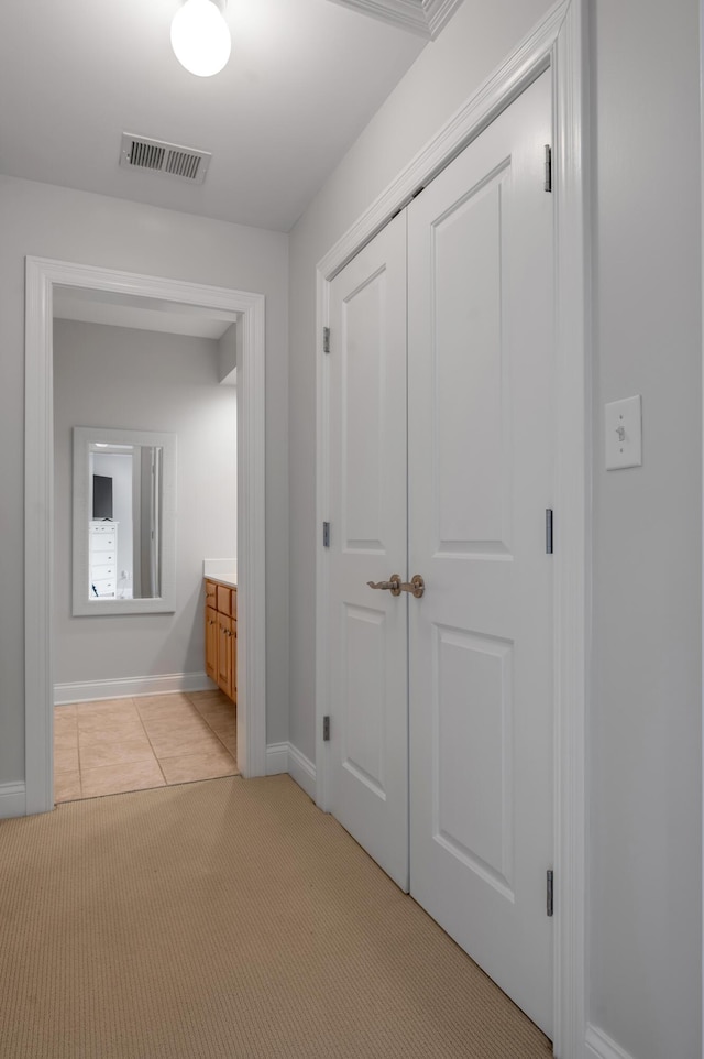 103 Windridge Dr, Nicholasville, KY 40356 - corridor featuring light carpet and light tile patterned flooring