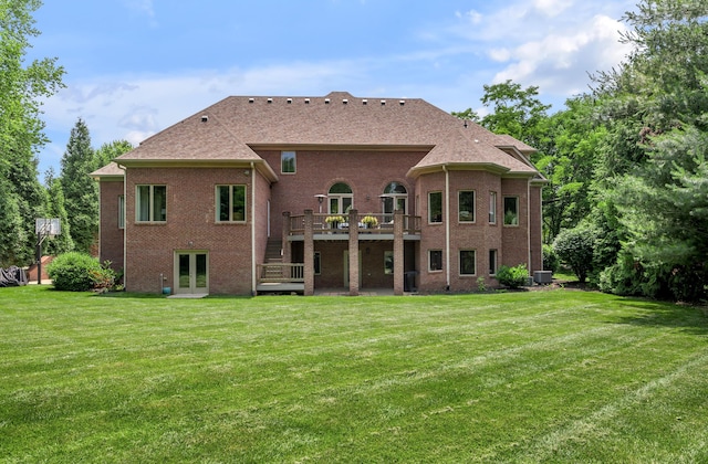 103 Windridge Dr, Nicholasville, KY 40356 - back of house featuring french doors, a wooden deck, a lawn, stairs, and brick siding