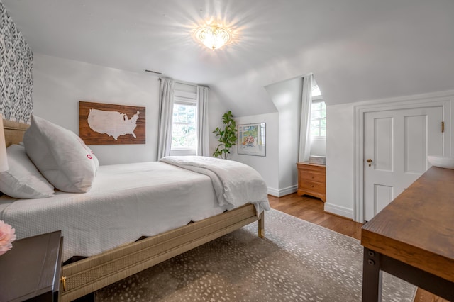 341 Kingsway Dr, Lexington, KY 40502 - bedroom with wood finished floors and lofted ceiling