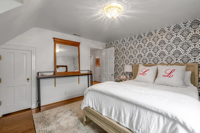 341 Kingsway Dr, Lexington, KY 40502 - bedroom with wood finished floors and wallpapered walls
