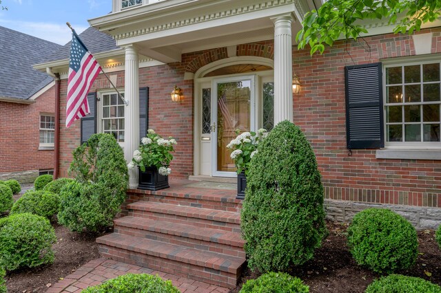 341 Kingsway Dr, Lexington, KY 40502 - property entrance with brick siding and roof with shingles