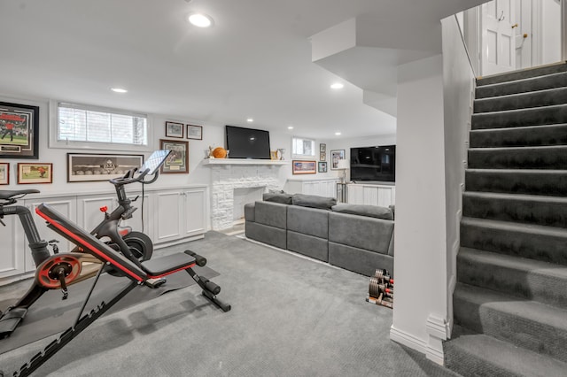 341 Kingsway Dr, Lexington, KY 40502 - workout room featuring recessed lighting, healthy amount of natural light, a fireplace, and carpet floors