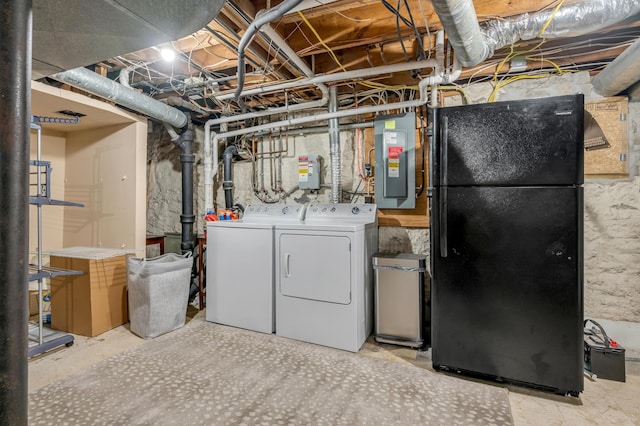 341 Kingsway Dr, Lexington, KY 40502 - unfinished below grade area featuring freestanding refrigerator, washing machine and dryer, and electric panel