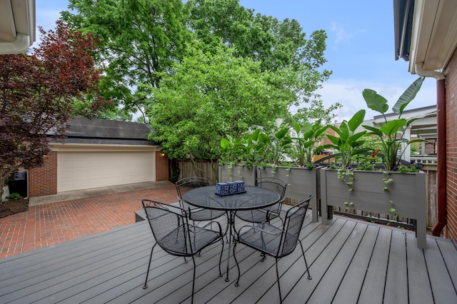 341 Kingsway Dr, Lexington, KY 40502 - deck with outdoor dining space and a garage
