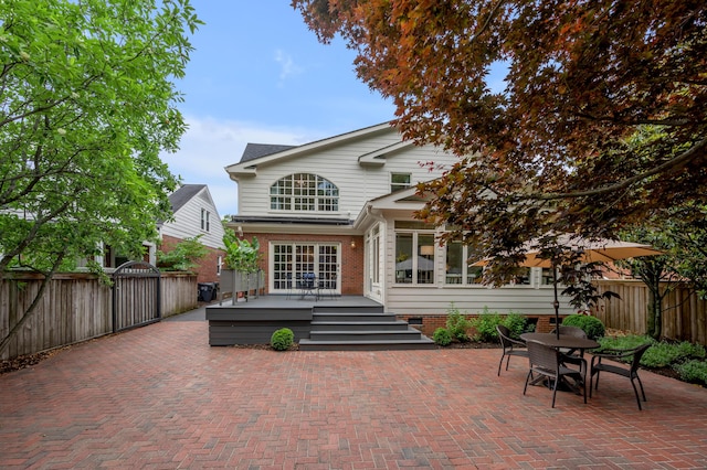 341 Kingsway Dr, Lexington, KY 40502 - rear view of house featuring a fenced backyard, a deck, a patio, and brick siding