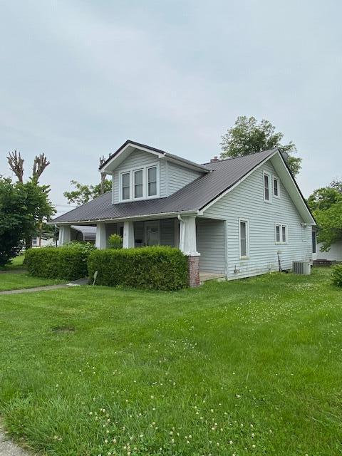 311 N Broadway St, Berea, KY 40403 - view of front facade with a front yard and a metal roof