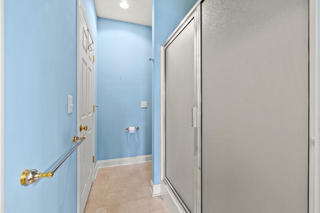 139 Delissa Dr, Georgetown, KY 40324 - bathroom featuring a stall shower and baseboards